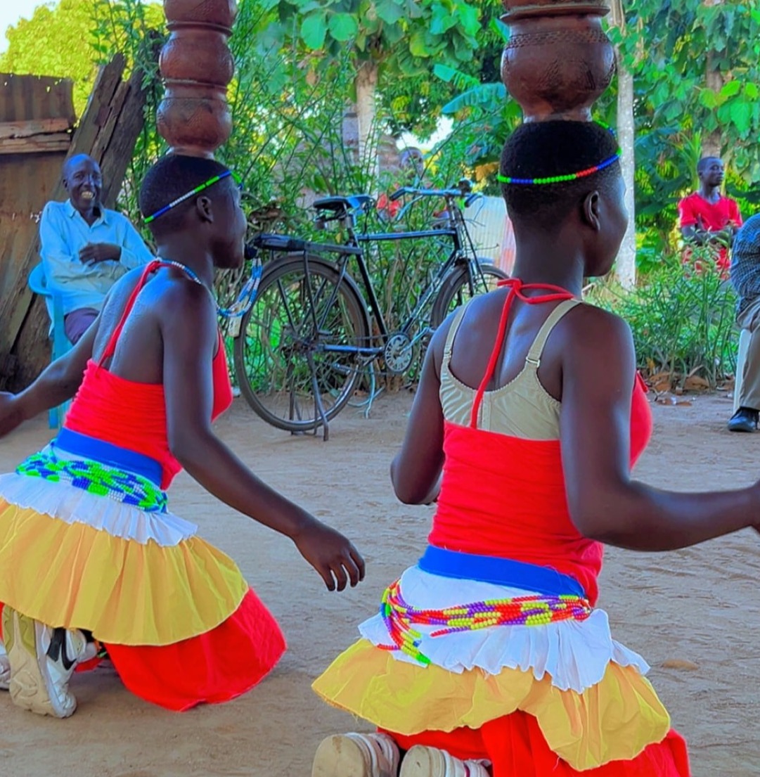 Amor women performing the great Oraki dance to luxury tourists in Pakwach recently