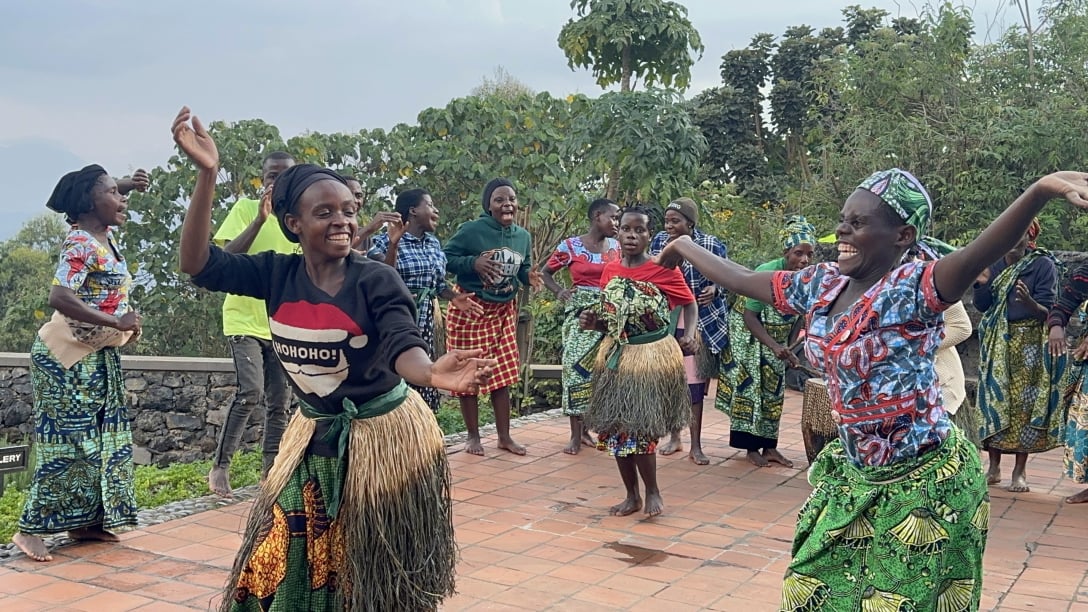 A group of Batwa women performing their rich cultural  dance to tourist in attendance in Rushaga, Bwindi impenetrable forest national park