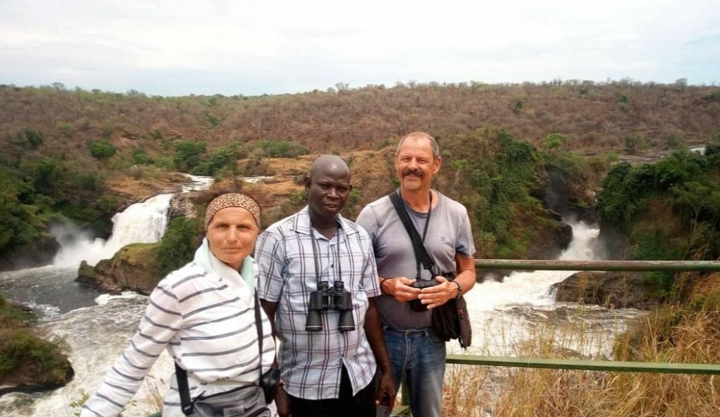 Tourists posing for photos at Murchison  falls national park in 2018