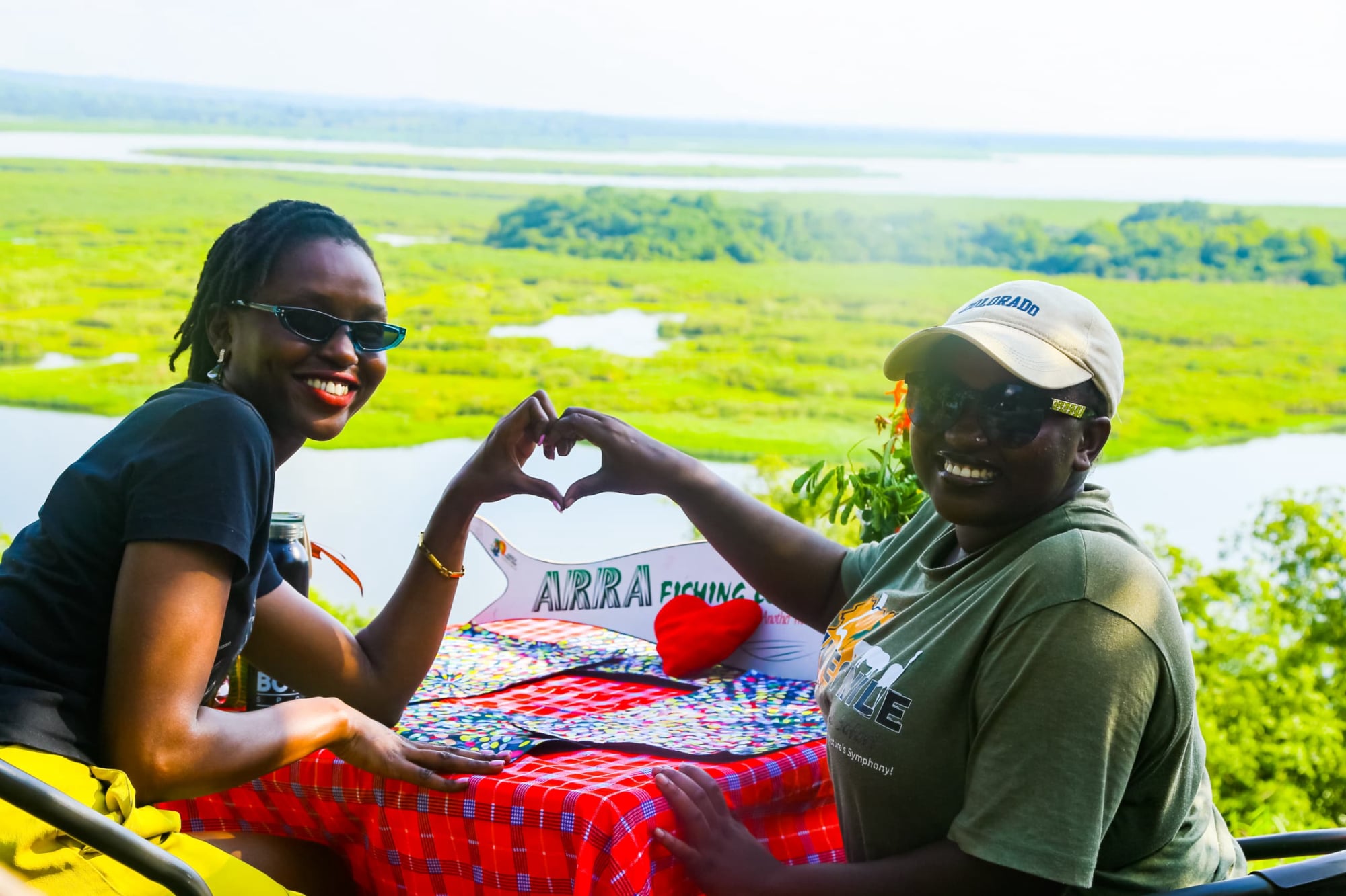 Two tourists having breakfast at the 200M long beach line at Arra fishing lodge